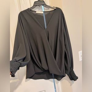 Great black dressy blouse.  Perfect for work or a pair of jeans and black belt.